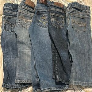 Lot of toddler jeans. Wrangler, Cody James & cowboy hardware. 5 pairs.